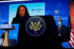 FILE - Dr. Marcella Nunez-Smith, who has been selected to serve as the chair of President-elect Joe Biden's COVID-19 equity task force, speaks in a video displayed during an event at The Queen theater in Wilmington, Del., Dec. 8, 2020.