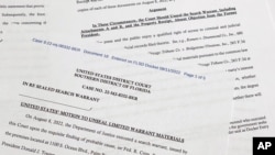 Dokiman legal Depatman Jistis Etazini prezante bay tribinal federal sid Florid la pou mande'l rann piblik manda ki te otorize FBI fouye kay ansyen Prezidan Donald Trump nan eta Florid la. 