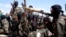 资料照片：“青年党”武装分子乘坐皮卡，兵临摩加迪沙城下。(2008年12月8日) 