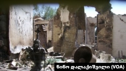 რუსული დაბომბვის შედეგად განადგურებული საეკლესიო ნივთები. ნიქოზი, 2008