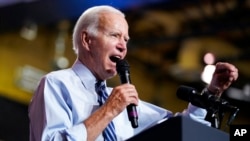 US President Joe Biden speaks during a rally hosted by the Democratic National Committee at Richard Montgomery High School, Aug. 25, 2022, in Rockville, Md. 