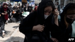 بخشی از خشونت طالبان علیه تظاهرات زنان در کابل (آرشیف)