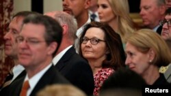 U.S. Central Intelligence Agency director nominee Gina Haspel center, attends Secretary of State Mike Pompeo's ceremonial swearing-in at the State Department in Washington. May 2, 2018.
