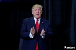 Republican presidential nominee Donald Trump attends a campaign rally in at the Florida State Fairgrounds in Tampa, Florida, U.S. November 5, 2016.