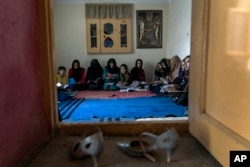 Afghan girls attend a class in an underground school, in Kabul, Afghanistan, Saturday, July 30, 2022. For most teenage girls in Afghanistan, it’s been a year since they set foot in a classroom. (AP Photo/Ebrahim Noroozi)