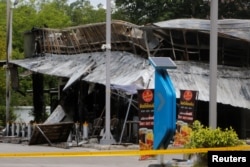 A shop is seen in an aftermath of an explosion which ripped through the southern Thailand province of Yala in what appeared to be multiple coordinated attacks in several locations, in Yala, Thailand, Aug. 17, 2022.