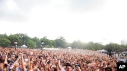 FILE - Crowd at Music Midtown in Piedmont Park in Atlanta, Sept. 16, 2018. 
