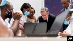 FILE - Secretary of State Antony Blinken visits an election transparency hackathon event at the Kinshasa Digital Academy in Kinshasa, Congo, Aug. 10, 2022, prior to traveling to Rwanda.