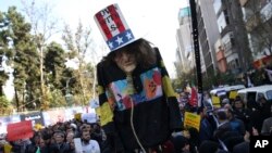 Rejim tərəfdarları Tehranda ABŞ sanksiyalarına etiraz edir. 4 noyabr, 2018.