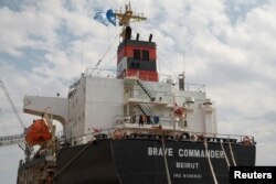 The bulk carrier Brave Commander is seen during loading with wheat for Ethiopia, amid Russia's war on Ukraine, in the sea port of Yuzhne, Odesa region, Ukraine, Aug. 14, 2022. (REUTERS/Valentyn Ogirenko)