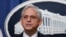FILE - Attorney General Merrick Garland speaks at the Justice Department, Aug. 11, 2022, in Washington.