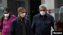Former Sri Lankan President Gotabaya Rajapaksa arrives at the Bangkok's Don Mueang International airport, August 11, 2022. 