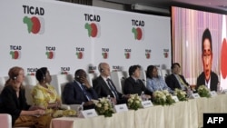 FILE - Japan's Prime Minister Fumio Kishida joins by video conference at the UN Development Program after the closing session of the eighth Tokyo International Conference on African Development (TICAD) in Tunisia's capital Tunis on August 28, 2022. (Photo by FETHI BELAID / AFP)