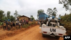 Moroccan soldiers from the U.N. mission in DRC (Monusco) patrol in the violence-torn Djugu territory, Ituri province, eastern DRCongo, March 13, 2020.