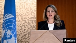 Canadian Foreign Minister Melanie Joly delivers a speech during a session of the U.N. Human Rights Council, following the Russian invasion in Ukraine, in Geneva, Switzerland, Feb. 28, 2022. 