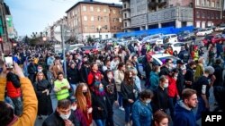 Participants attend a rally in support of jailed Kremlin critic Alexei Navalny in Vladivostok on April 21, 2021. 