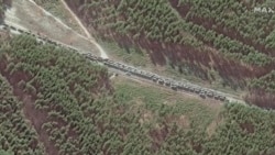 This satellite image provided by Maxar Technologies shows the northern end of a convoy at the southeast of Ivankiv, north west of Kyiv, Ukraine, Feb. 28, 2022.