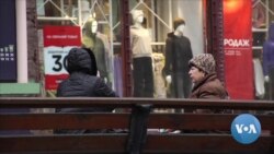 Solemn Kyiv Copes with Bombs, Gunfire