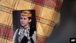 A picture of missing woman Emmilee Risling sits on a table at the Risling family home on Jan. 21, 2022, in McKinleyville, California. (AP)
