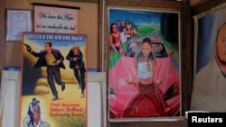 Movie posters commissioned for a foreign client are seen at Ghanaian artist Daniel Anum Jasper's workshop in Accra, Ghana February 20, 2022. (REUTERS/Francis Kokoroko)