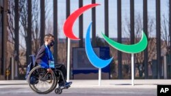 Italy's Matteo Remotti Martini moves in front of the Agitos outside the Paralympic Village ahead of the Beijing 2022 Winter Paralympic Games, Beijing, China, March 3, 2022. 