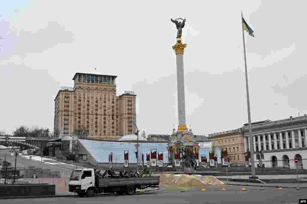 A truck loaded with anti-tanks barriers is parked at Independence Square in Kyiv, March 1, 2022.