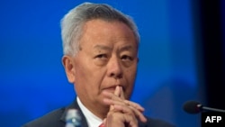 FILE - Jin Liqun, President of the Asian Infrastructure Investment Bank (AIIB), speaks in Washington, Oct. 15, 2017. 