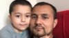 Ibrahim Abliz, a Uyghur refugee in Poland, with his 4-year-old son, in March 2022. (Courtesy of Ibrahim Abliz)