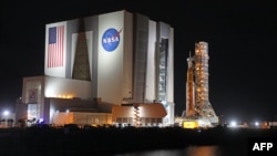 The Artemis-1 rocket is rolled out from the Vehicle Assembly Building at the Kennedy Space Center in Florida on Nov. 3, 2022. 