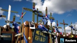 FILE - A view of a memorial at Centennial Park almost one month after Hurricane Ian landfall in Fort Myers, Florida, Oct. 26, 2022. Tropical Storm Nicole is heading toward Florida's Atlantic coast, and is expected to make landfall as a hurricane as early Nov. 9, 2022.