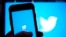 FILE - The Twitter application is seen on a digital device, April 25, 2022, in San Diego.