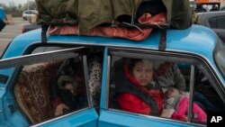 Internally displaced people from Mariupol and nearby towns fleeing from the Russian attacks, arrive at a refugee center , in Zaporizhzhia, Ukraine, April 21, 2022.