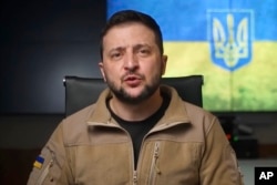FILE - In this image from video provided by the Ukrainian Presidential Press Office, Ukrainian President Volodymyr Zelenskyy speaks from Kyiv, April 22, 2022.
