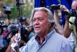 FILE - President Donald Trump's former chief strategist Steve Bannon speaks with reporters in New York, Aug. 20, 2020.