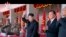 FILE - North Korean leader Kim Jong Un, center, and Liu Yunshan, China's Communist Party's No. 5 leader, second right, waves during a ceremony to mark the 70th anniversary of the country's ruling party, in Pyongyang, Oct. 10, 2015.