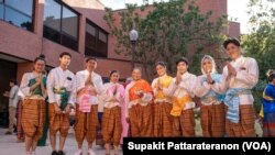 Students post for pictures during the Thai Cultural Show event organized by the Department of Ethnomusicology, the UCLA Herb Alpert School of Music, at Schoenberg Hall, University of California, Los Angeles (UCLA).