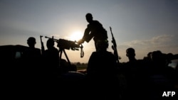 FILE - Somali National Army soldiers are seen in the Middle Shabelle region of Somalia, Dec. 10, 2012. Weapons and ammunition donated by the U.S. to the SNA has arrived in Somalia, the U.S. Embassy in Mogadishu announced March 1, 2023. (Stuart Price/AU-UN IST/AFP) 