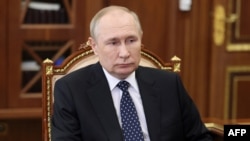FILE - Russian President Vladimir Putin at a meeting in Moscow on Jan. 5, 2023. Putin announced this week he will suspend Russia's participation in the New START treaty, which limits the number of warheads deployed by Russia and the United States.