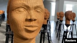 Terra cotta heads seen on display at a museum, a French woman collection representing the remaining Chibok school girls in captivity in Lagos, Nigeria, November 29, 2022. (REUTERS/Seun Sanni)