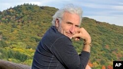 FILE - This 2019 photo shows Howard Irwin Fischer in Vermont. Fischer is one supporter who sees human composting as an eco-friendly way to return his remains to the earth as fresh, fertile soil when he dies. 