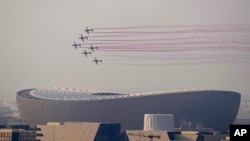 A flypast of takes place over the Lusail Stadium in Lusail, Qatar, where the World Cup final soccer match between Argentina and France is going to be played on Dec. 18, 2022. 