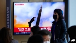 FILE - A TV screen shows an image of North Korea's missile launch during a news program at the Seoul Railway Station in Seoul, South Korea, Nov. 19, 2022.