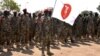 South Sudan soldiers at the Army headquarters in Juma prepare for deployment to the Democratic Republic of Congo, Dec. 28, 2022. (Sheila Ponnie/VOA)