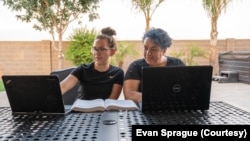 Penny (right) and Stacy Good, a mother and daughter in Maricopa Community College's artificial intelligence program, which receives support from Intel's AI for Workforce Program. (Credit: Evan Sprague/Intel Corporation)