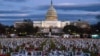 Gedung Capitol di National Mall, Washington, D.C., Sabtu, 17 Desember 2022, menjadi latar belakang acara penghormatan warga Iran yang diduga dibunuh oleh pemerintah mereka dalam aksi solidaritas untuk mendukung protes yang sedang berlangsung di Iran. (AP Photo/Nathan Howard)
