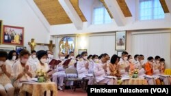 Officials pay their respects in front of a picture of Thailand’s Princess Bajrakitiyabha as she has been hospitalized due to a heart problem during the merit-making ceremony at Wat Thai Washington, DC, Silver Spring, MD. Dec 19, 2022.