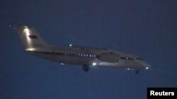 The Antonov An-148 plane which, according to local media, carries Russian citizen Victor Bout, an arms dealer, who was exchanged for U.S. basketball player Brittney Griner during a prisoner swap, lands at Vnukovo International Airport in Moscow, Russia, Dec. 8, 2022.