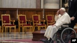 Pope Francis leaves after the funeral ceremony for Australian Cardinal George Pell in St. Peter's Basilica at the Vatican, Jan. 14, 2023. Cardinal Pell died Jan. 10, 2023, at a Rome hospital of heart complications following hip surgery. He was 81. 