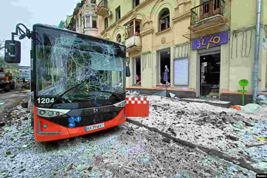 A city bus damaged by airstrike is seen in central Kharkiv, March 14, 2022.