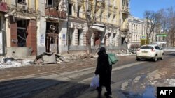 დაბომბილი სახლები ქ. ხარკოვში. უკრაინა, 12 მარტი, 2022.